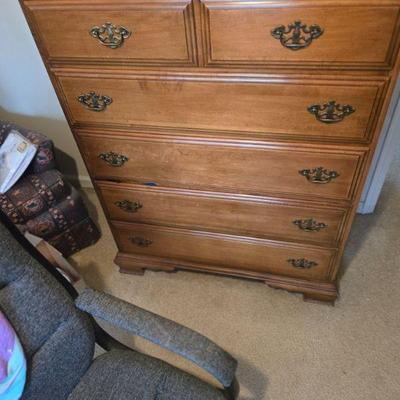 Wooden Dresser with Brass Handles
- This elegant vintage wooden dresser, featuring intricate brass handles, offers both functionality and...