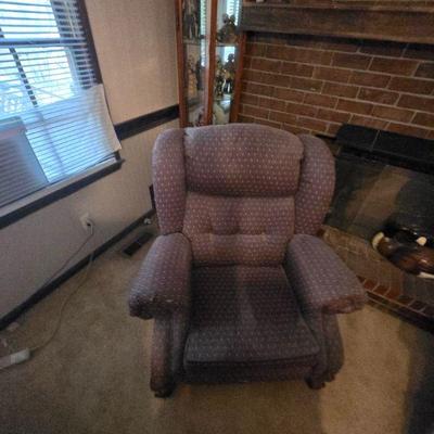 Upholstered Recliner
•    Indulge in comfort with this cozy purple upholstered recliner! Featuring plush cushions and soft fabric, this...