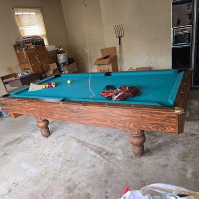  Classic Pool Table
•	Get ready for endless hours of fun with this stunning, well-maintained pool table! Featuring a rich wood grain...