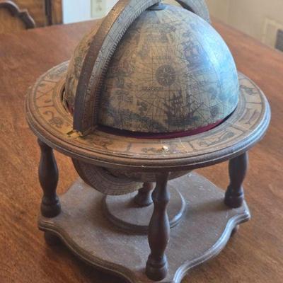 Vintage Glass Globe and Shot Glass Stand
- This vintage glass globe doubles as a drink holder and is a statement piece for any home bar....