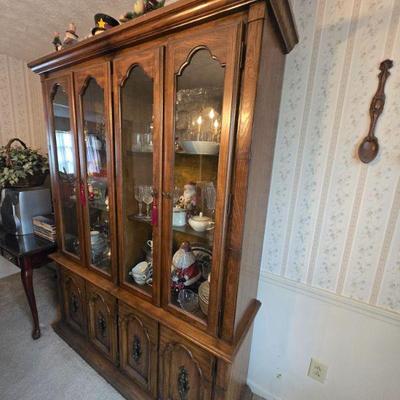 Sale Photo Thumbnail #34: Vintage Glass Display Cabinet
•	A stunning wooden display cabinet with glass doors, ideal for showcasing collectibles, china, or cherished treasures. The detailed craftsmanship and classic design make it a beautiful addition to any home, especially for 