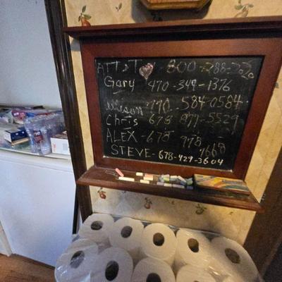 Classic Chalkboard Message Board
•	A quaint chalkboard message board with a wooden frame. Perfect for jotting down reminders, shopping...