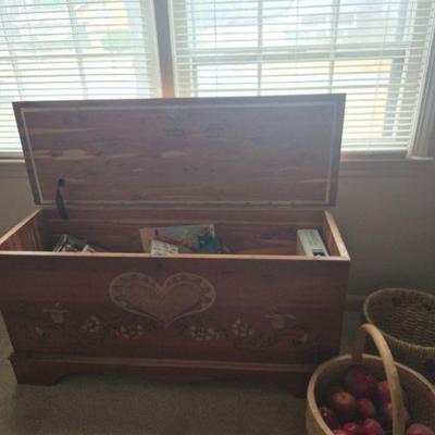 Rustic Wooden Chest
- A rustic, hand-carved wooden chest with a heart-shaped motif on the front. This storage chest adds a nostalgic...