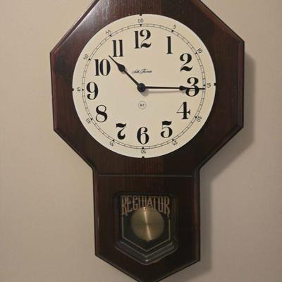 Regulator Wall Clock
- A timeless Regulator wall clock with a classic design. Featuring bold black Roman numerals on a white face, this...