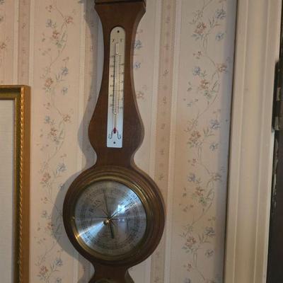 Sale Photo Thumbnail #84: Vintage Barometer and Thermometer Wall Set
- A beautifully crafted vintage barometer and thermometer wall set, perfect for those who appreciate antique weather instruments. Made with a wooden frame and brass accents, it brings both charm and functionality