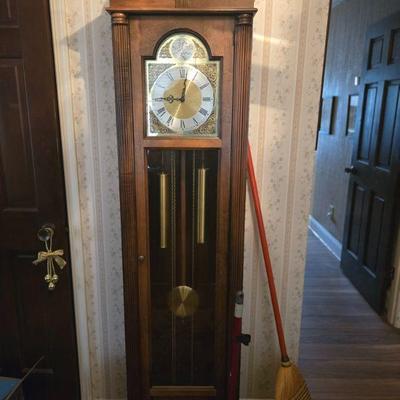 Grandfather Clock - Classic Wooden Design
•	A timeless grandfather clock with a rich wooden finish and elegant Roman numerals. Features a...