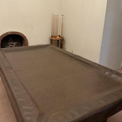 Pool table with cover