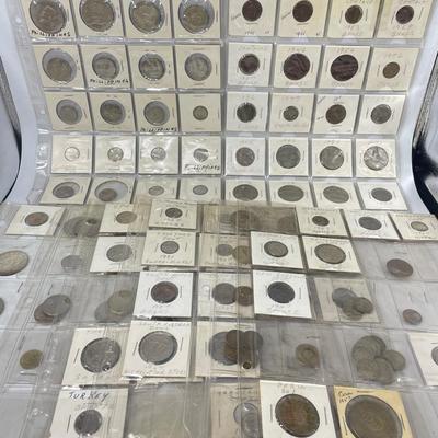 TN48 Eight Sheets Of Foreign Coins