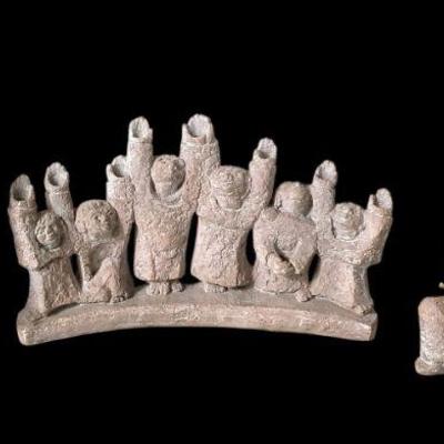 JAKA227 Menorah Designed By Ellen Lord, Produced By Austin Productions	Made of composite material to resemble the stones of Jerusalem....
