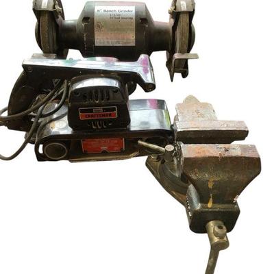 JAKA659 Grinder, Sander And Vise Assortment	This lot includes a Craftsman model 315. 11720 3 inch belt sander, a 6" bench grinder...