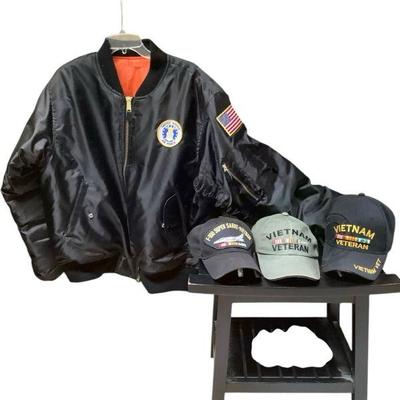 JAKA916 Rothco MA-1 Flight Jacket With Patches And Baseball Type Hats	Jacket appears to be XL with little to no wear.   It has many...