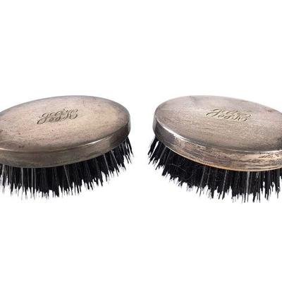 JAKA239 Two Sterling Silver Backed Grooming Brushes	Couple of sterling silver backed brushes. 
