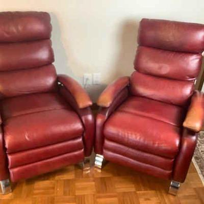 JAKA815 Barcalounge Recliners	Pair of barcalounge recliners in a red (Miramar rouge) with chrome legs and nice tufted backside. Great...