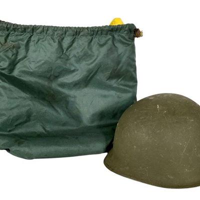 JAKA229 Vintage Military US Army M1 helmet	Issued in 1973, this type of helmet was used from WWII through 1980's. 
