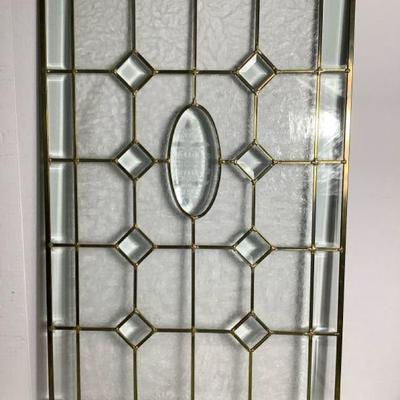 JAKA634 Leaded Clear Stained Glass Window Lot 2	Beveled diamond pattern surrounded by frosted leaf design. 35.5"L 21.75"W.

