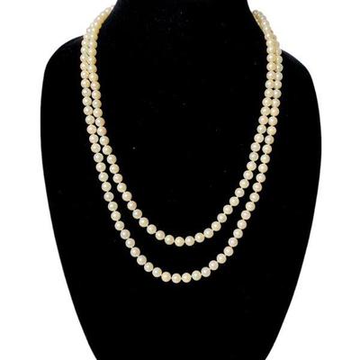 JAKA220 Vintage Hand Knotted Pearl Strand	Ornate clasp stamped "S", individual knotted pearls.
