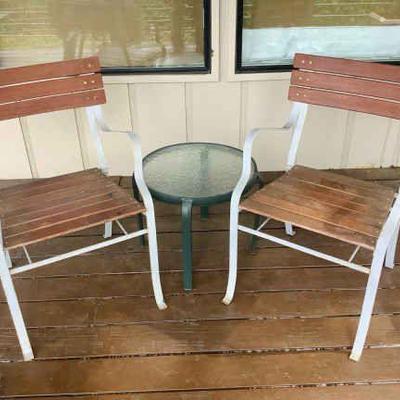 JAKA830 Wrought Iron Garden Chairs	Pair of vintage wrought iron and wood slat French style garden chairs. Also includes lightweight table.
