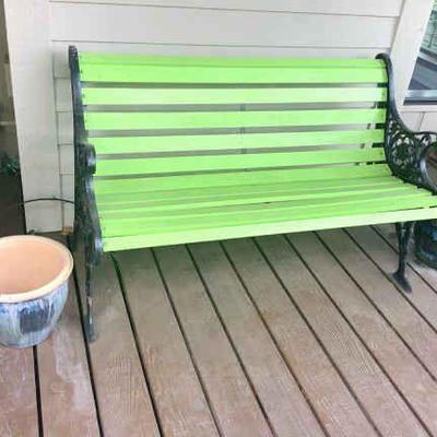 JAKA832 Garden Bench And Pottery	Cast iron lime green garden bench with wooden slats. Also includes pair of ceramic glazed planters....