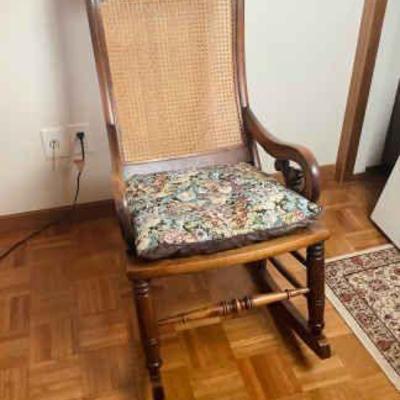 JAKA814 Vintage Looking Caned Rocking Chair	Measures approximately 40" tall by 30" deep by 21" wide. Seat is slightly...