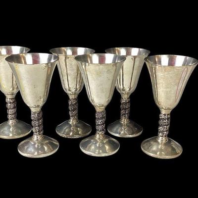 JAKA735 Ornate1960’s Silver Plated Wine Goblets Made in Madrid Spain, Lot 2	Detailed twisted grapevine stems around neck of goblet
