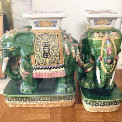 JAKA829 Green Handed Painted Ceramic Elephants	Pair of vintage hand painted green ceramic elephant furniture stands. Both measure...