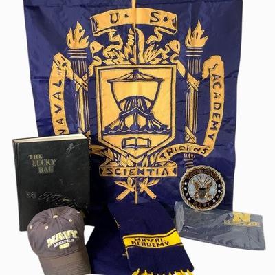 JAKA228 U.S Naval Collection	includes USNA flag, baseball cap, USNA Storm Duds ponch, knitted scarf, and more
