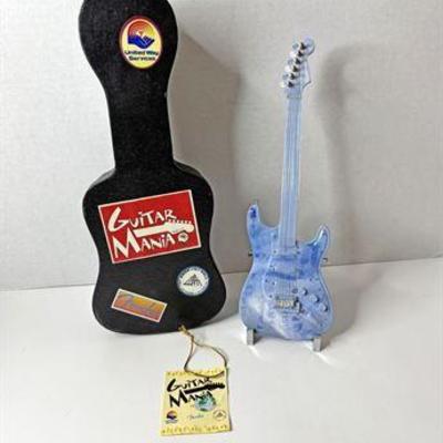 Yoko Ono Imagine Peace Mini Guitar .jpg
