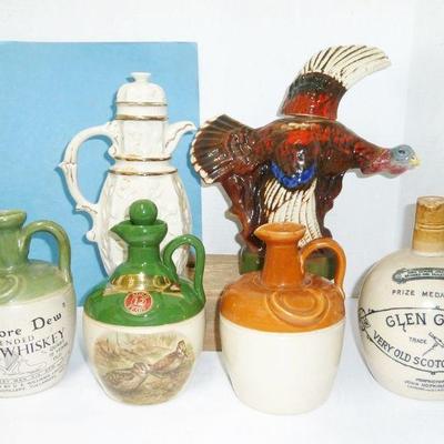 Lot of whiskey jugs, nice selection