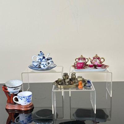 (4pc) Miniature Tea Sets | Limoges (France) burgundy miniature tea set Delft (Germany) blue and white miniature tea set Chinese blue and...