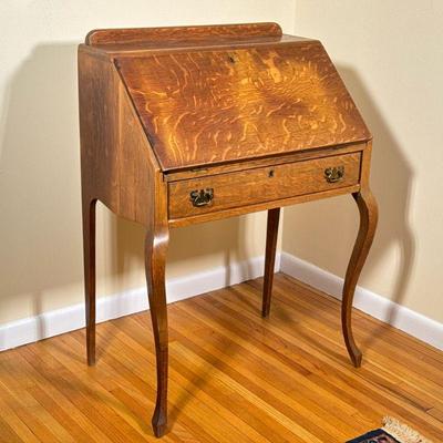 Tiger Oak Secretary Desk | Antique carved "Tiger Oak" secretary desk with lid that opens to reveal a writing surface and...