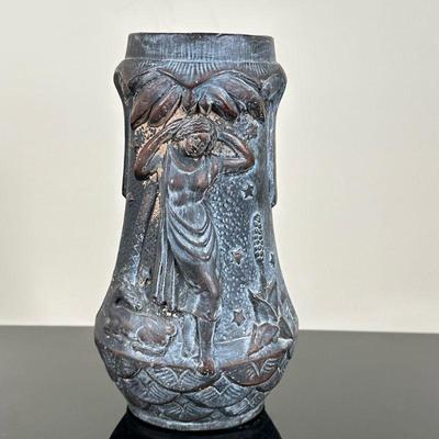 Brass or Copper Relief Vase | Brass or copper relief vase with detail of woman under a palm tree in the night sky with an animal. - h. 9...