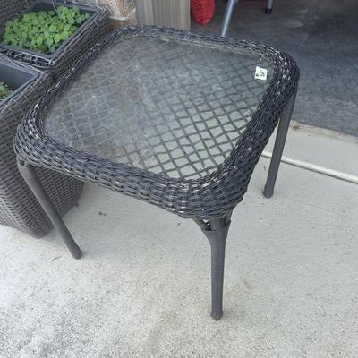 Glass top wicker table