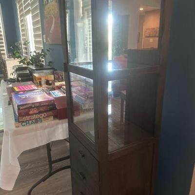 Display case with drawers on the bottom