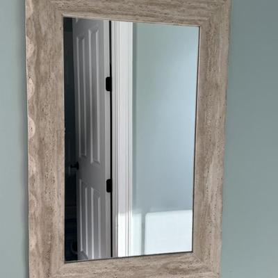 Travertine stone mirror Measures 36” x 24” 