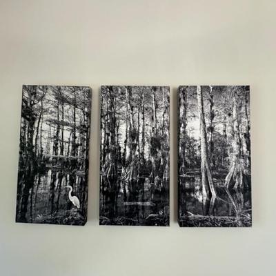 Black and white swamp landscape triptych measures 24” x 12” for each panel. 
