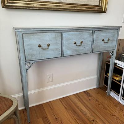  Stunning shade of blue. Three drawer buffet/foyer/console table. Measures 50” wide x 12” deep x 41” tall. 