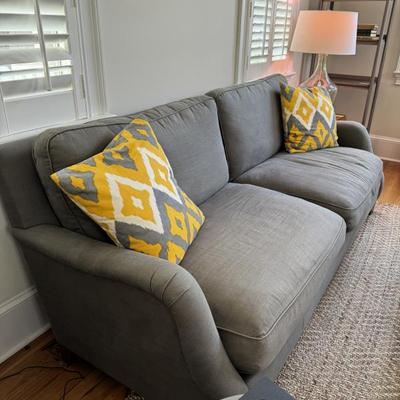 Classic grey linen fabric sofa. Fully down-filled.  Measures 84” wide x 37” deep x 36” tall