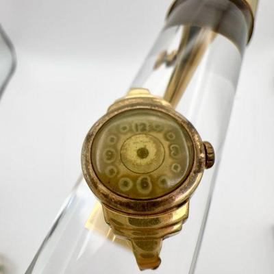 14KT Gold Waltham Watch Face
