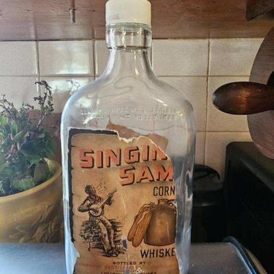 Singing Sam vintage whiskey bottle