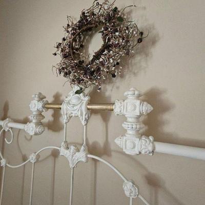 Antique wrought-iron bed (headboard)