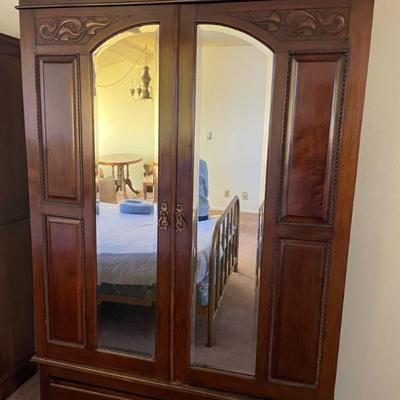 SKU B24  LARGE MIRRORED  SOLID WOOD WALNUT ARMOIRE/WARDROBE.  75 H BY 47 W BY 18 D.

$300