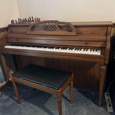 Piano with Bench
- A Yamaha upright piano, complete with a matching bench, perfect for music lovers or someone looking to start playing....