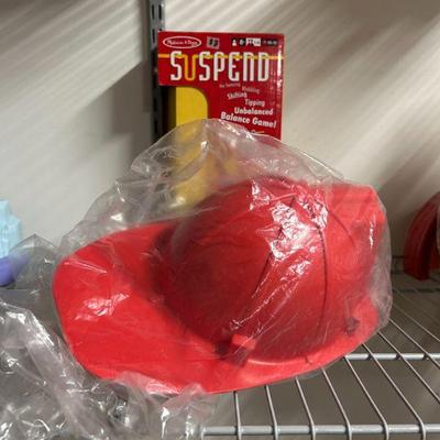 Red Toy Firefighter Helmet (Plastic) - Bring out the little hero in your child with this durable Red Toy Firefighter Helmet! Made from...