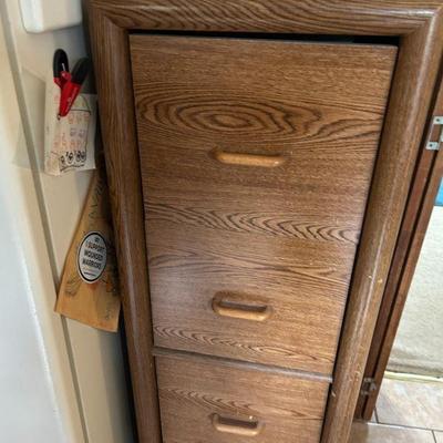 Vintage Wooden Filing Cabinet
- This charming vintage wooden filing cabinet adds a touch of retro charm to any office or study. With four...
