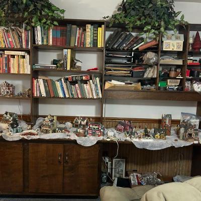Vintage Christmas Village Display with Buildings
- A nostalgic collection of small Christmas village buildings, set up with lights,...