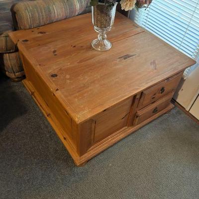 Rustic Coffee Table
- A charming, rustic coffee table made of pine wood, offering both storage and surface space. The natural finish and...