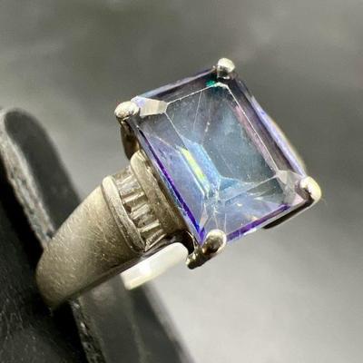 Sparkling Emerald Cut Sterling Silver Ring with Diamond Accents
