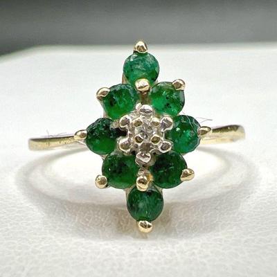 Sparkling Green 14Kt Gold Ring with Diamond Center

