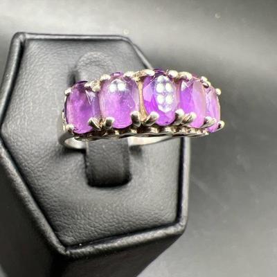 Sterling Silver Ring with Five Purple Gemstones
