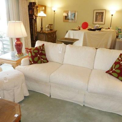 White Slipcovered Sofa $180 (Floral pattern underneath)